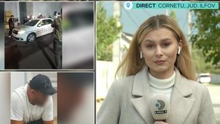 A tras cu arma spre o casă