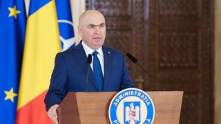 Ilie Bolojan, cu avionul de linie &icirc;n Franța. Președintele interimar ia parte la reuniunea organizată la Paris