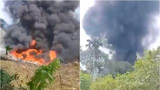 Fum negru după prăbușirea avionului Hercules