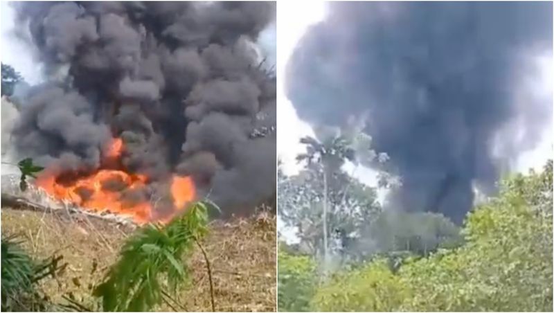 Fum negru după prăbușirea avionului Hercules