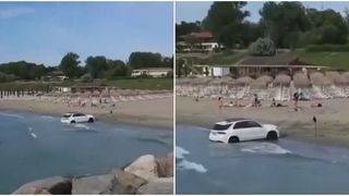 VIDEO Șofer imprudent pe o plajă din Olimp. Mașina a rămas blocată &icirc;n nisip