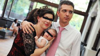 Uliana si Condrea, la botezul baietelului lor. David are acum 4 ani