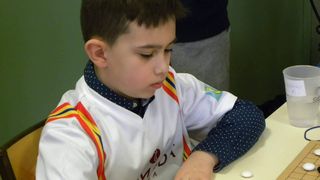 Un copil de clasa a doua din Botosani, premiat la un concurs de samurai ai mintii