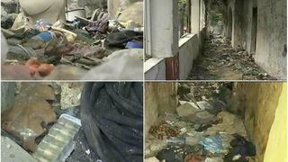 Focar de infectie in centrul Bucurestiului, chiar langa un spital. Seringi folosite, carpe pline de sange, resturi de medicamente si gunoaie. Cladirea e o adevarata bomba ecologica