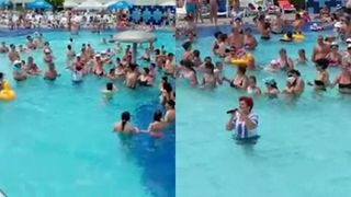 Concert de muzica populara in piscina! Romanii au inceput sa danseze hora in apa. Cantareata a intrat in piscina cu tot cu microfon