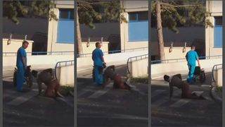 Imagini şocante &icirc;n faţa spitalului de Urgenţă din Călăraşi. Un bătr&acirc;n se t&acirc;răşte &icirc;n genunchi pe trecerea de pietoni sub privirile nepăsătoare ale unui infirmier