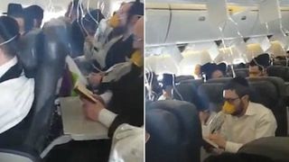 Panica la bordul unui avion. Pasagerii, toti cu mastile de oxigen la gura, au inceput sa se roage in cor