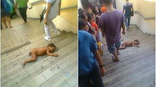 Imaginile care iti vor da fiori! Bebelus lasat sa zaca dezbracat pe scarile de la metrou. Sute de oameni au trecut nepasatori pe langa el