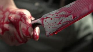 Un iesean a transat porcul de Craciun, apoi si-a injunghiat cumnatul