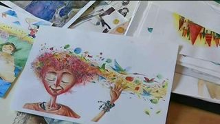 Si-a creat propria lume de basm din ilustratii colorate ajutat de fiul sau. Desenele lui sunt iesite din comun