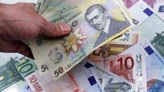 Euro a ajuns la minimul istoric al acestui an
