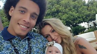 Fotbalistul belgian, alaturi de sotie si de fetita lor