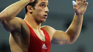 Un luptator roman a luat medalie la Jocurile Olimpice de la Beijing dupa 8 ani. Cum e posibil asa ceva?