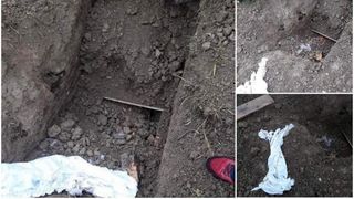 Descoperire halucinantă &icirc;n Mureș. Cadavrul unui bărbat găsit dezgropat, cu urme uriașe de zg&acirc;rieturi pe sicriu