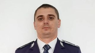 El este poliţistul care a sărit şi l-a prins pe t&acirc;nărul care &icirc;ncerca să se sinucidă