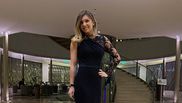 Simona Halep  poartă o rochie neagră