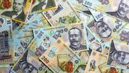 Românii cu vechime vor beneficia de bani în plus