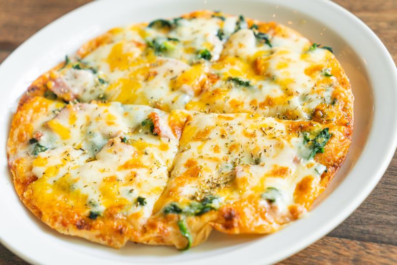 Pizza cu brânză. O altă versiune a rețetei de Quattro Formaggi!
