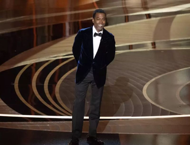 Chris Rock, prima reacție după ce a fost lovit peste față de actorul Will Smith