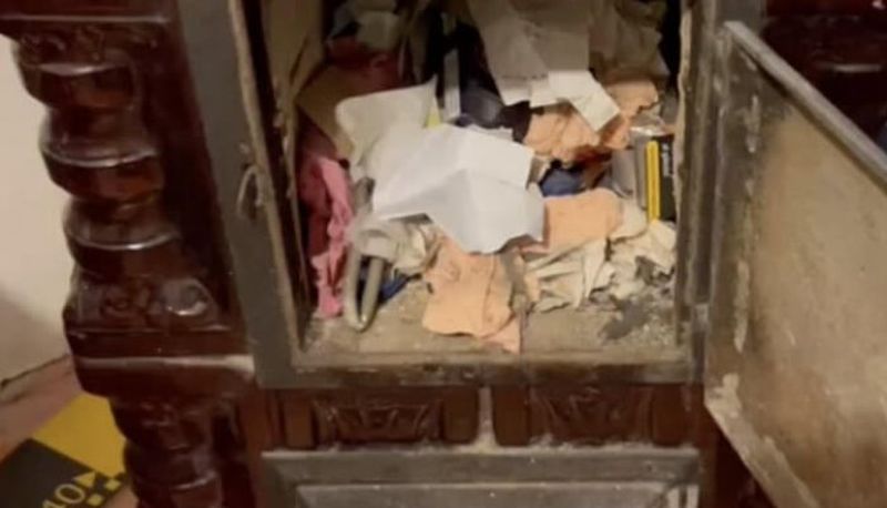 Ascunsese o parte din banii furați în sobă