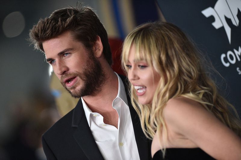 Liam Hemsworth si Miley Cyrus cand formau un cuplu