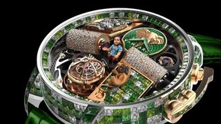 Extravaganță fără limite: Fiul celui mai bogat om din Asia și-a comandat un ceas cu el st&acirc;nd pe un tron de aur &icirc;n centrul cadranului