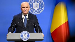 Reacția lui Bolojan după ce Avocatul Poporului susținut de PSD a atacat la CCR OUG-ul care permite tăieri &icirc;n administrație